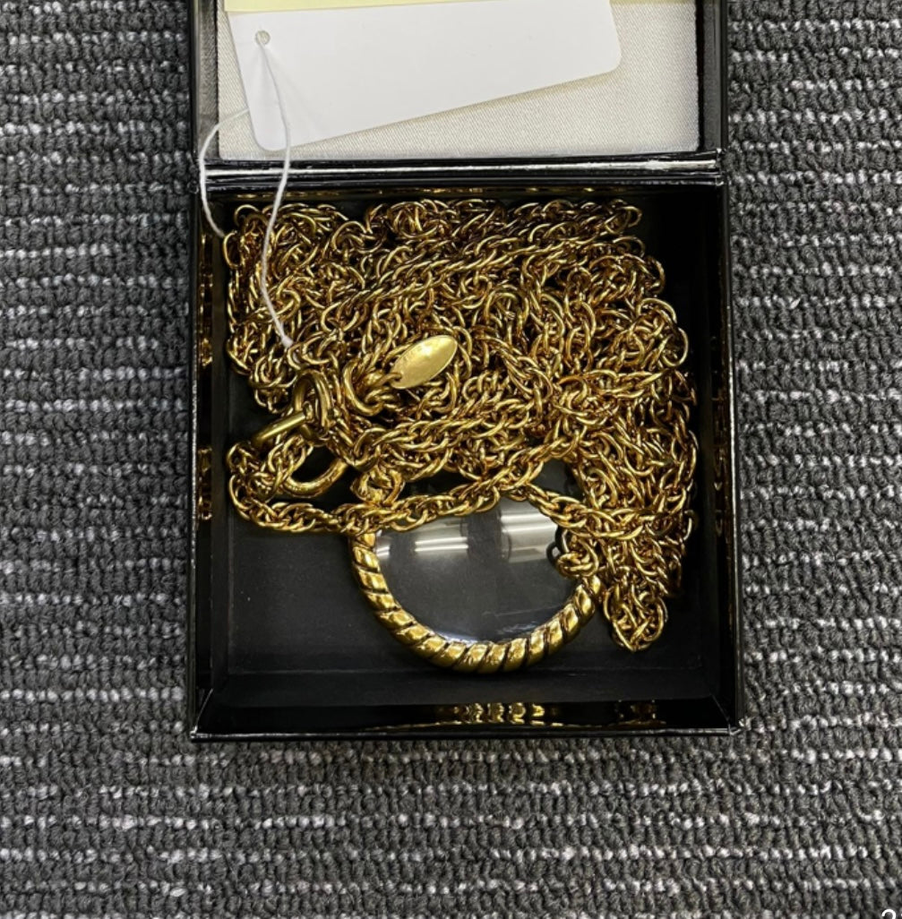 Chanel rare perfume charm and Chanel magnifying glass necklace