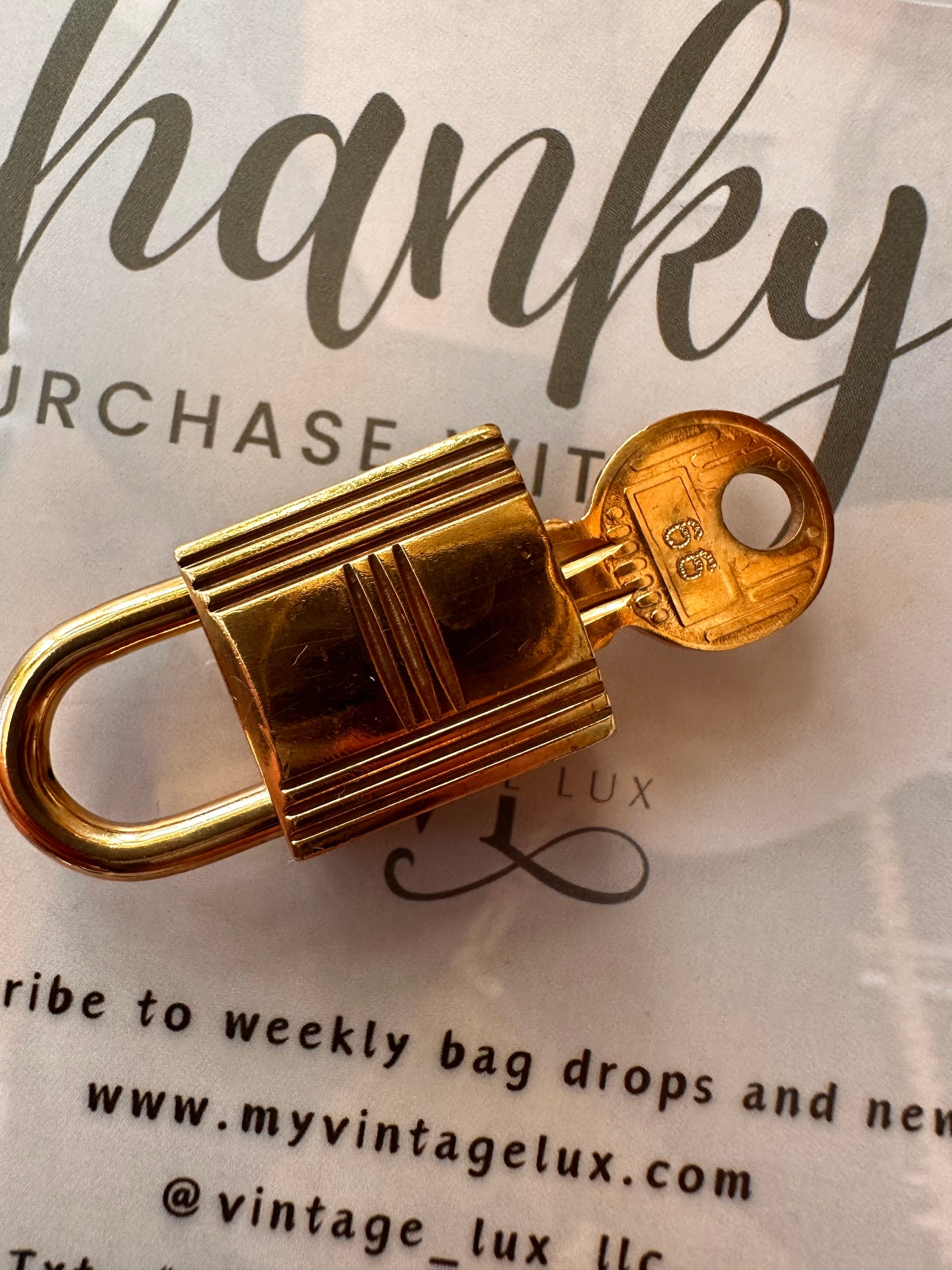 Hermes gold lock and key