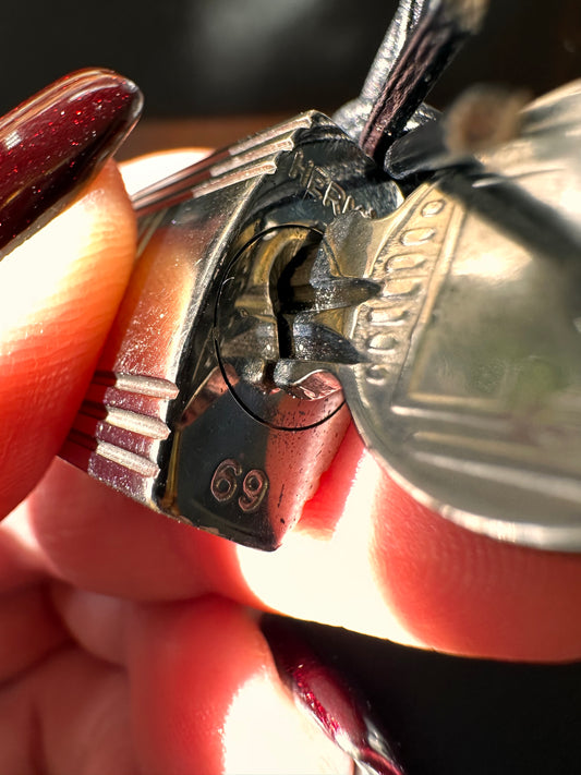 Hermes palladium lock and key
