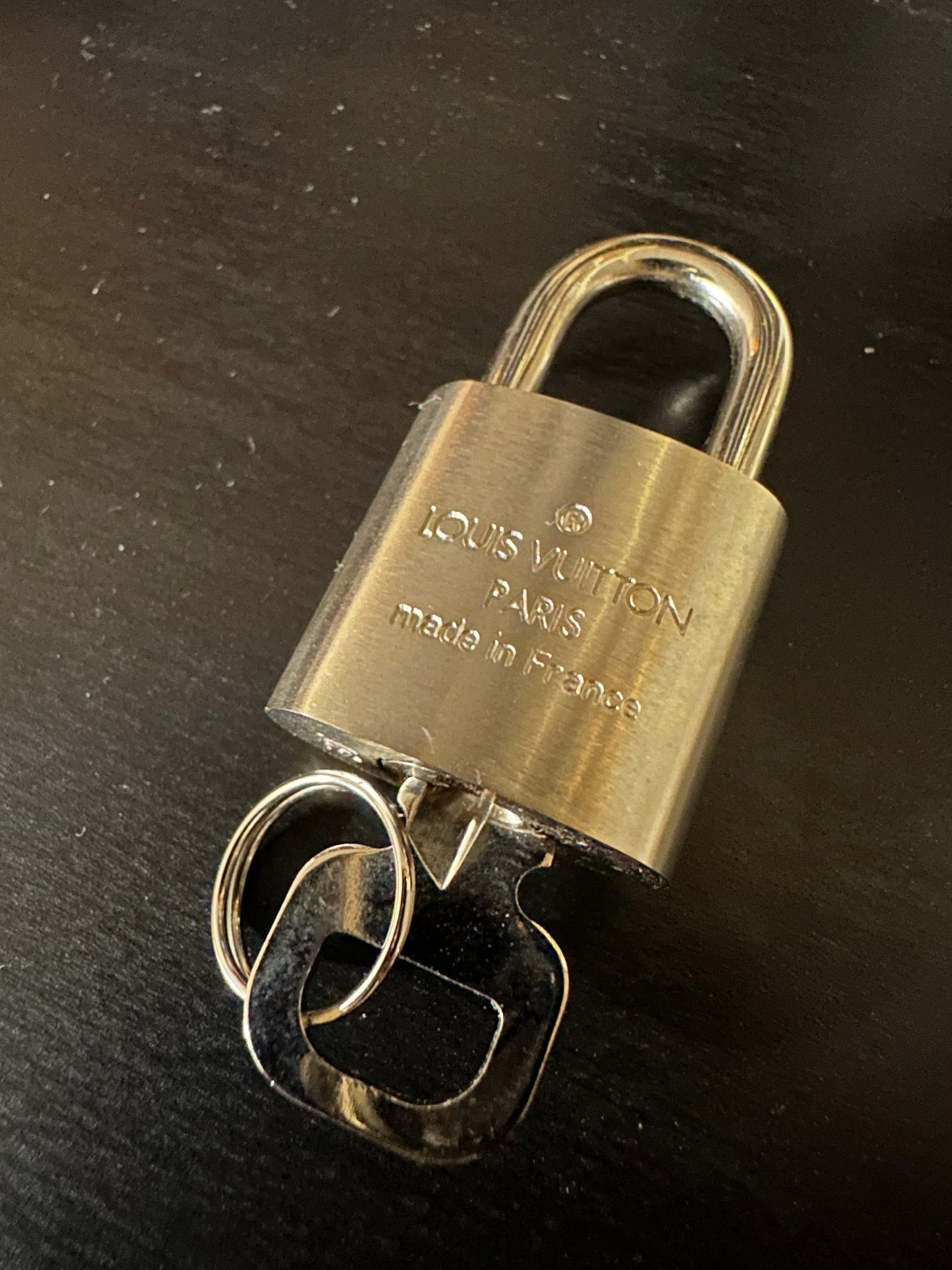 Louis Vuitton silver lock and key