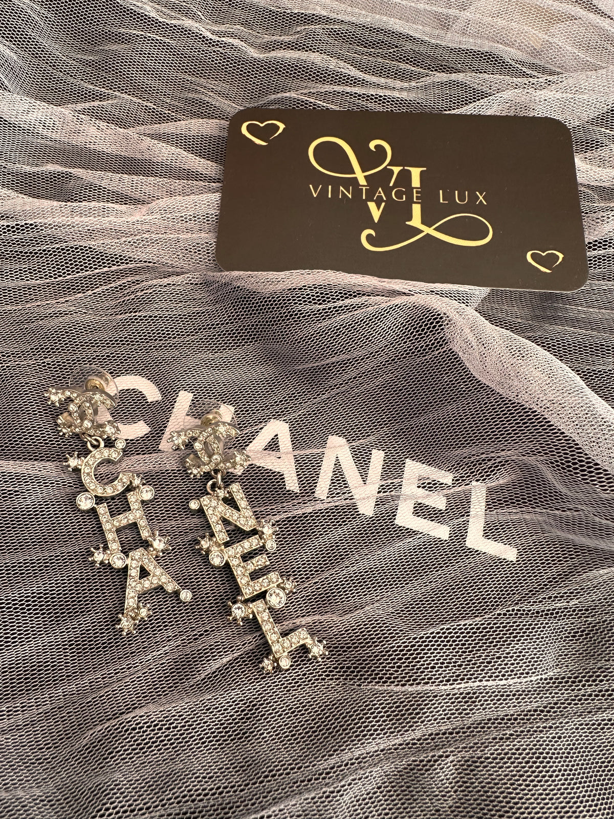 Chanel drop down logo earrings