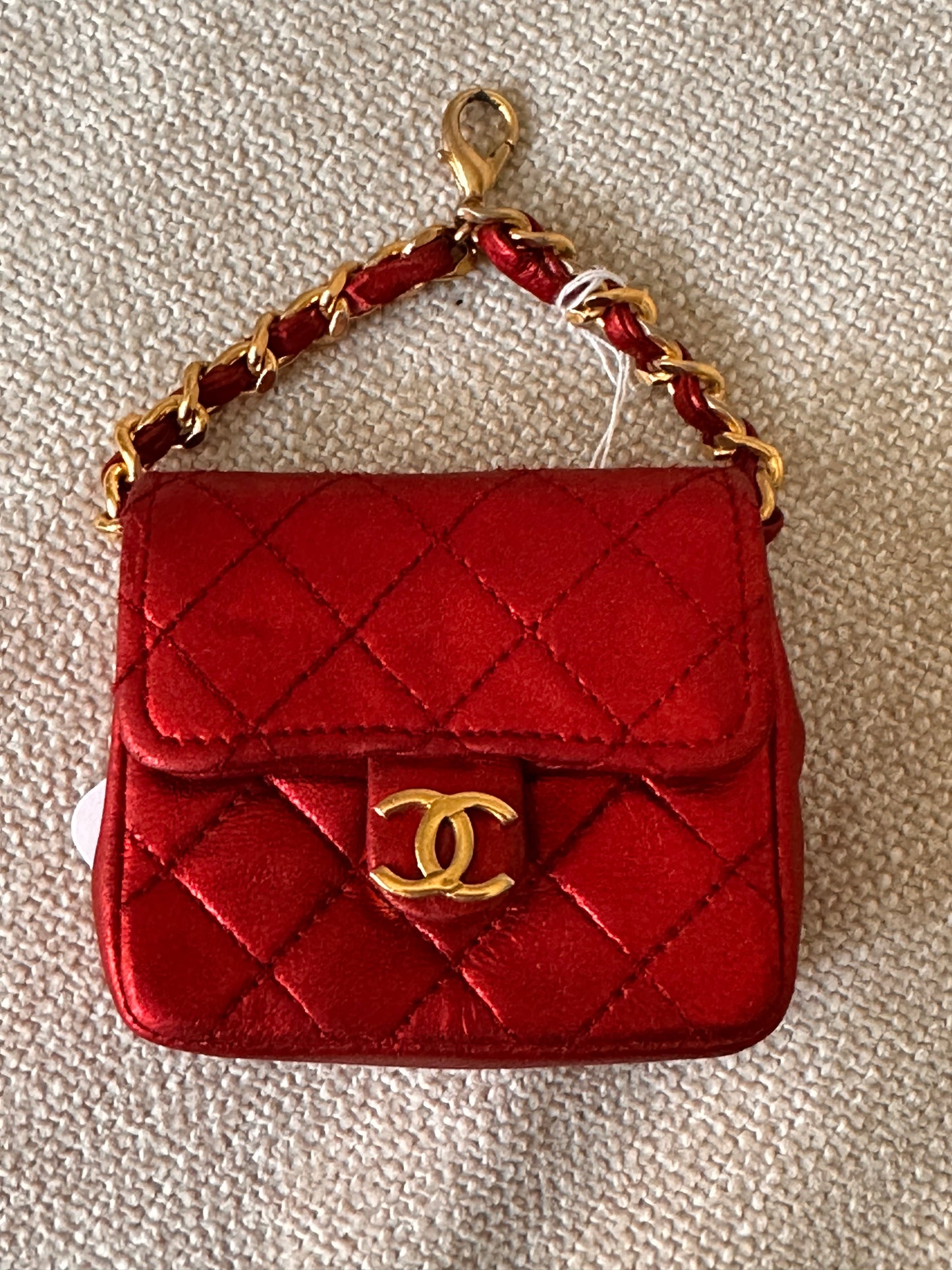 YSL raffia and Chanel micro pouch