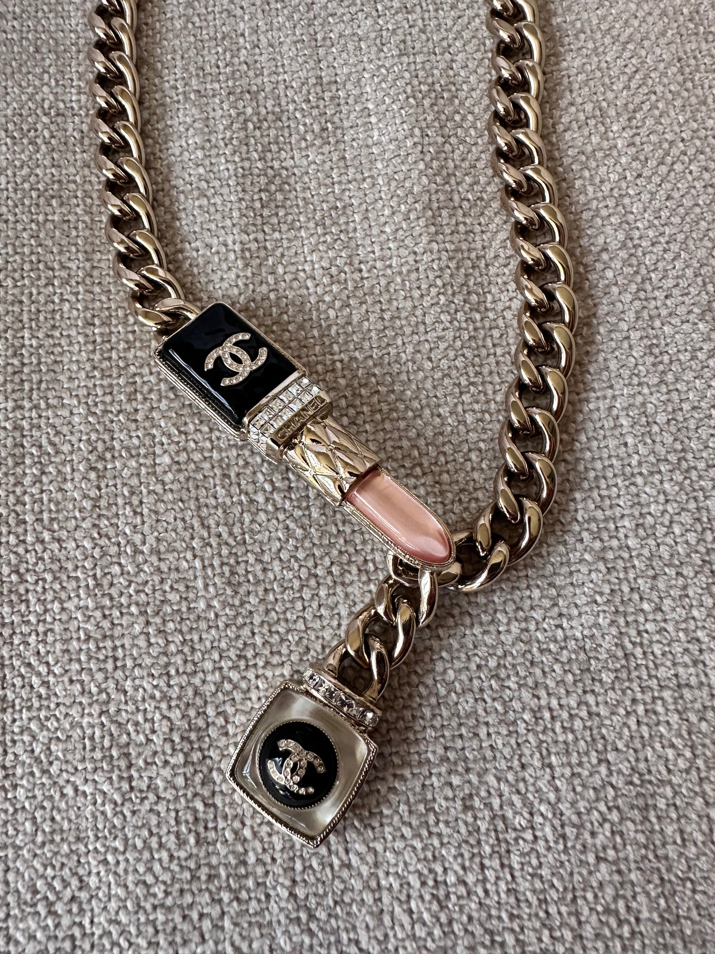 Chanel lipstick necklace