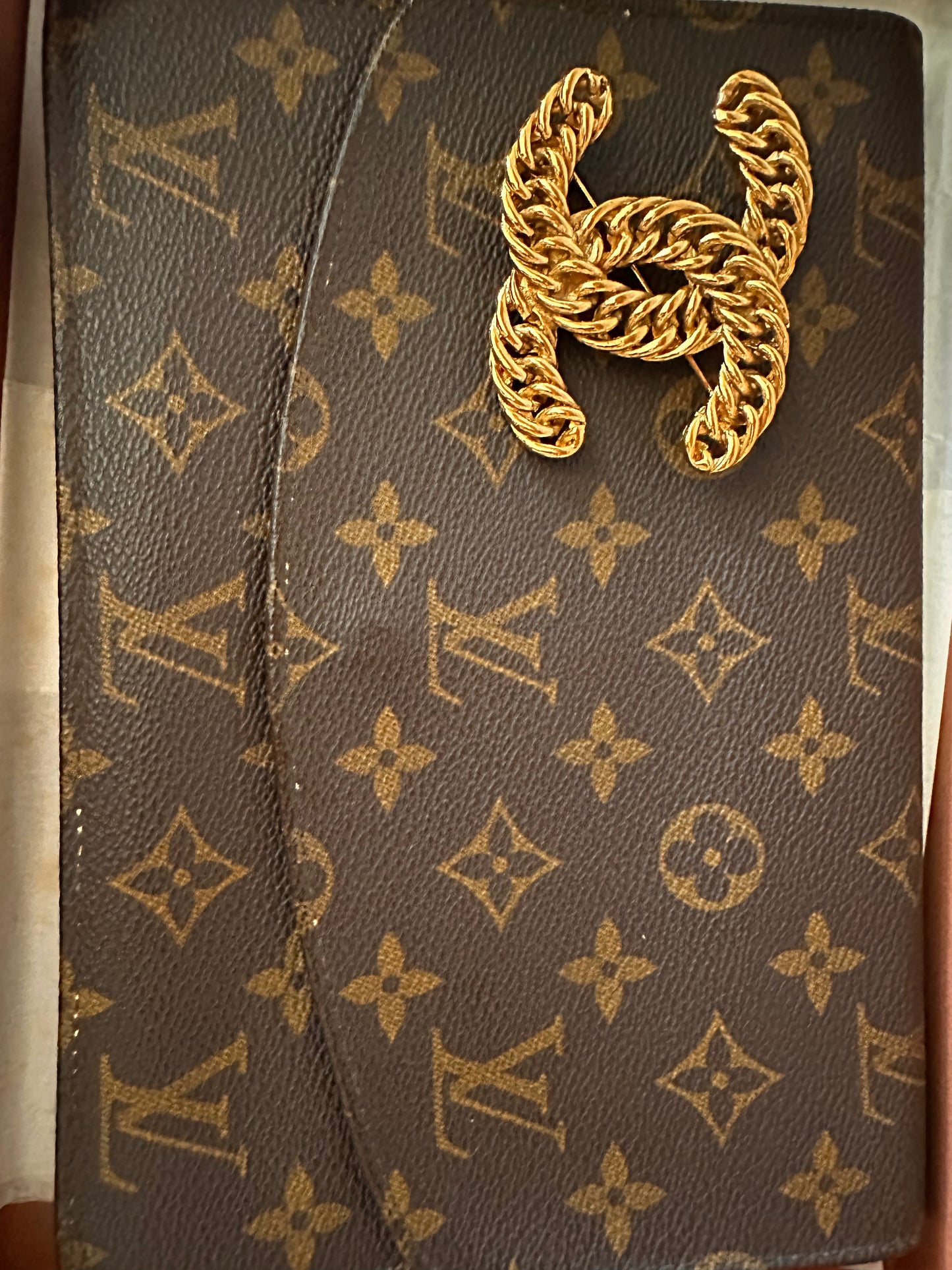 Louis Vuitton clutch and Chanel brooch bundle